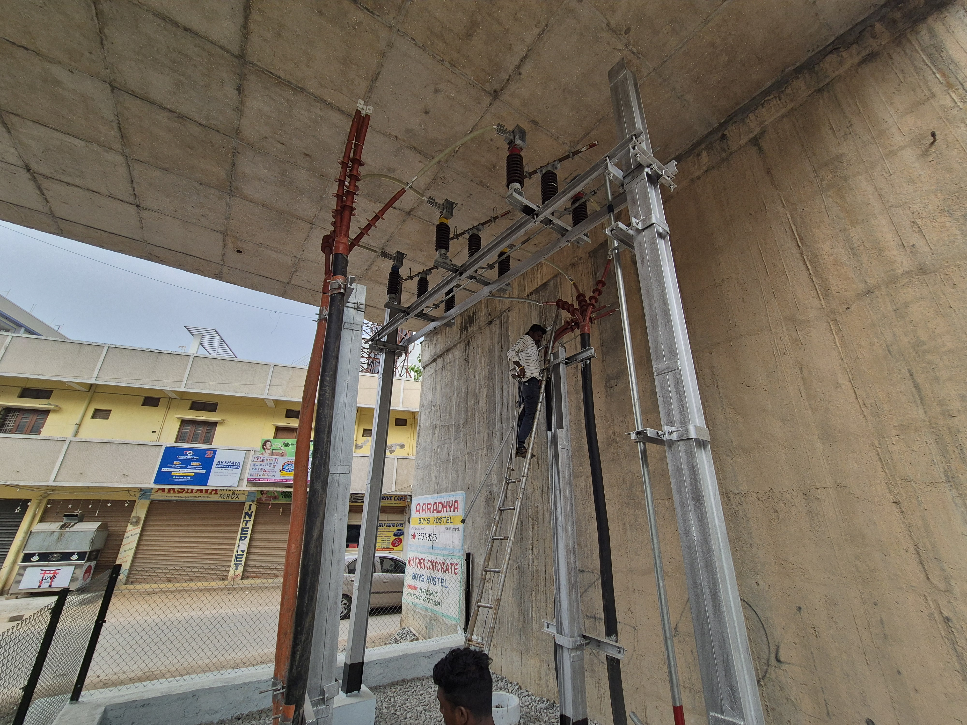 Men Working on Pole
