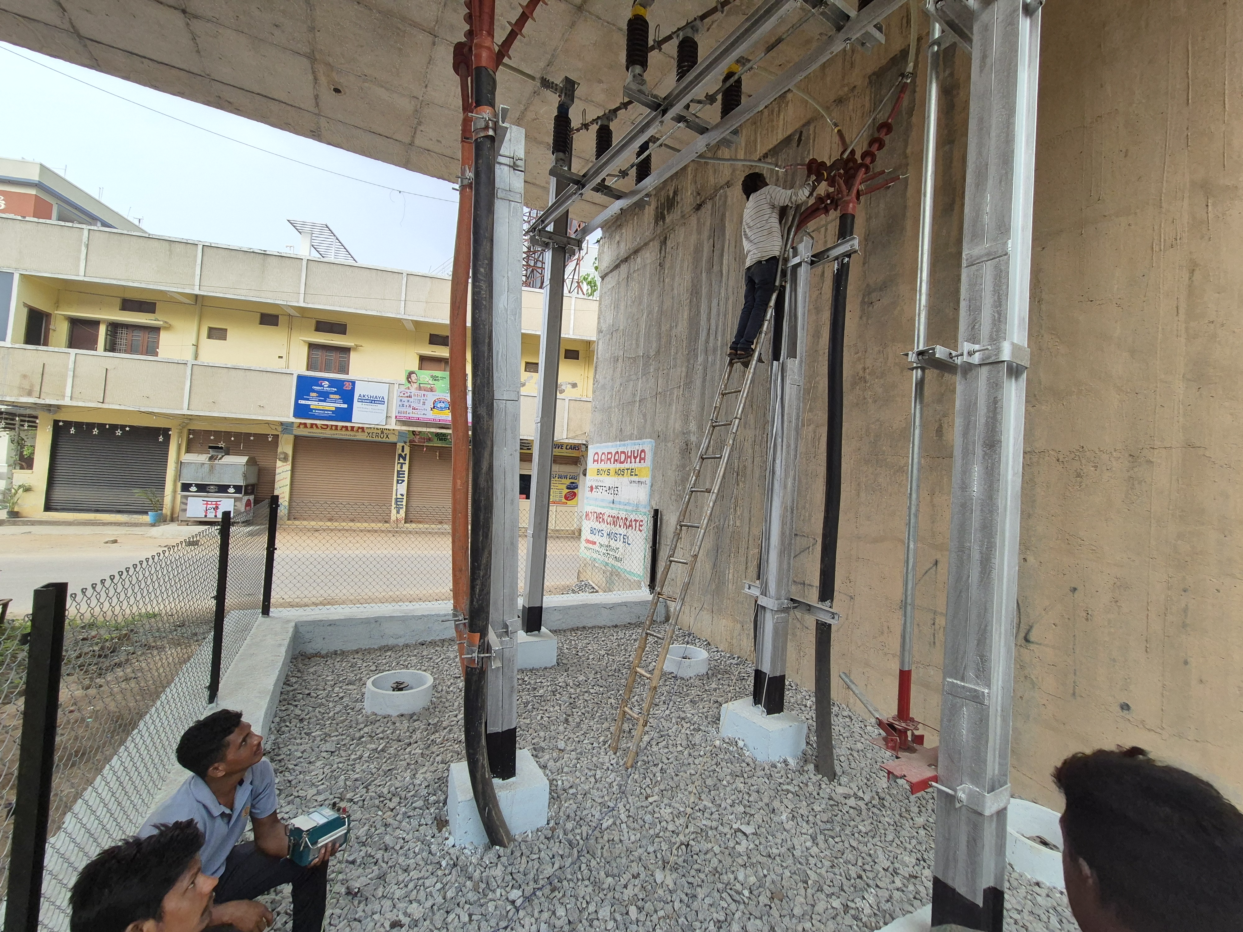 Men Working on Pole